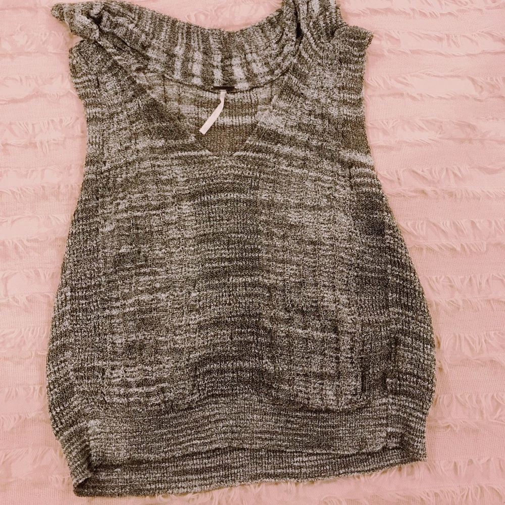 Low neck, cropped gray sweater tank top.